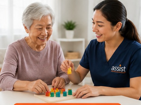 Geriatric occupational therapist helping an older adult practice fine-motor and daily living skills